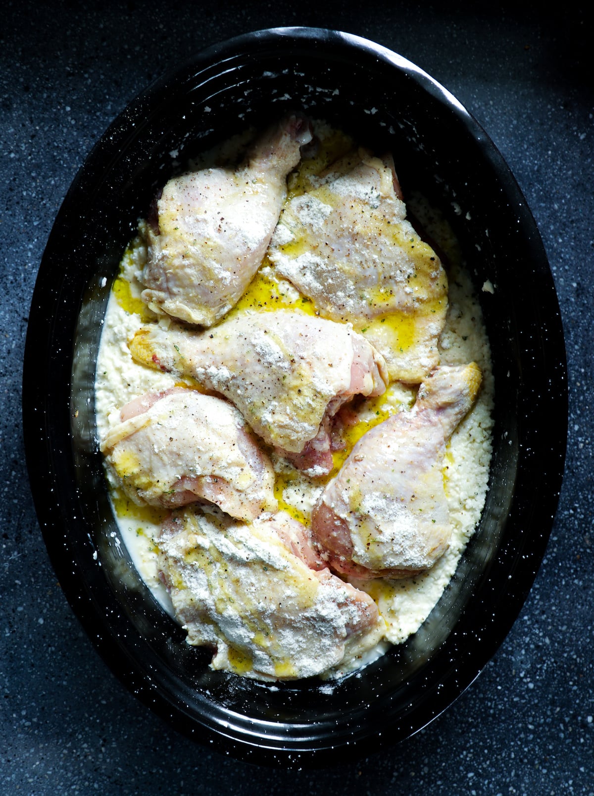 Keto Cheesy Ranch Chicken & Rice in an enamel roasting pan before baking