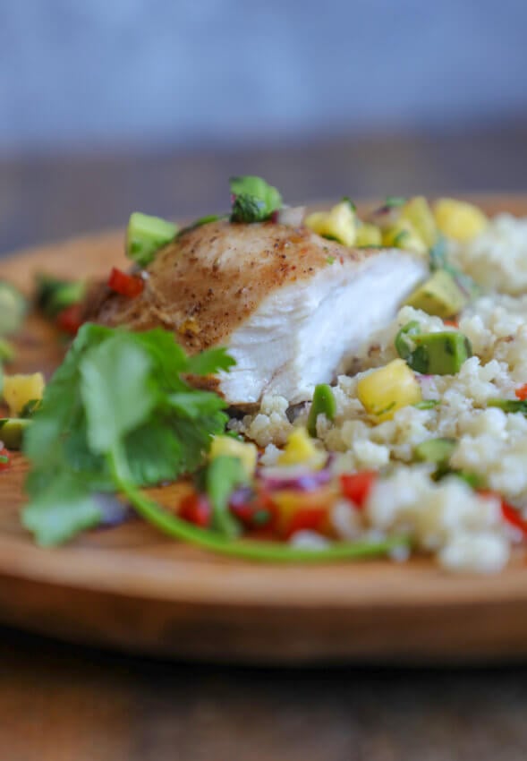 Keto Jerk Chicken Dinner with a cross section of the juicy chicken showing