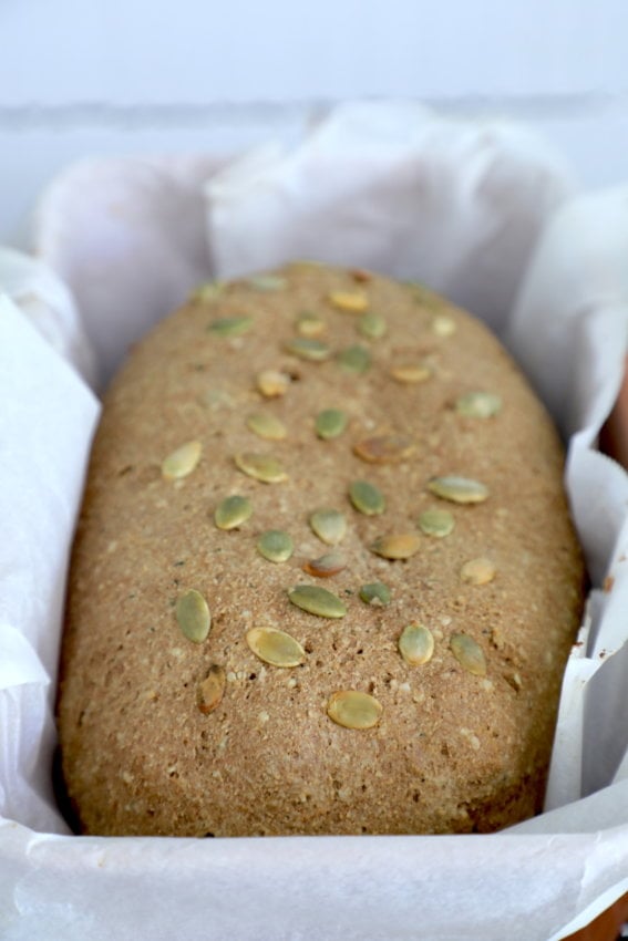 SCK bread loaf in a parchment lined bread pan.