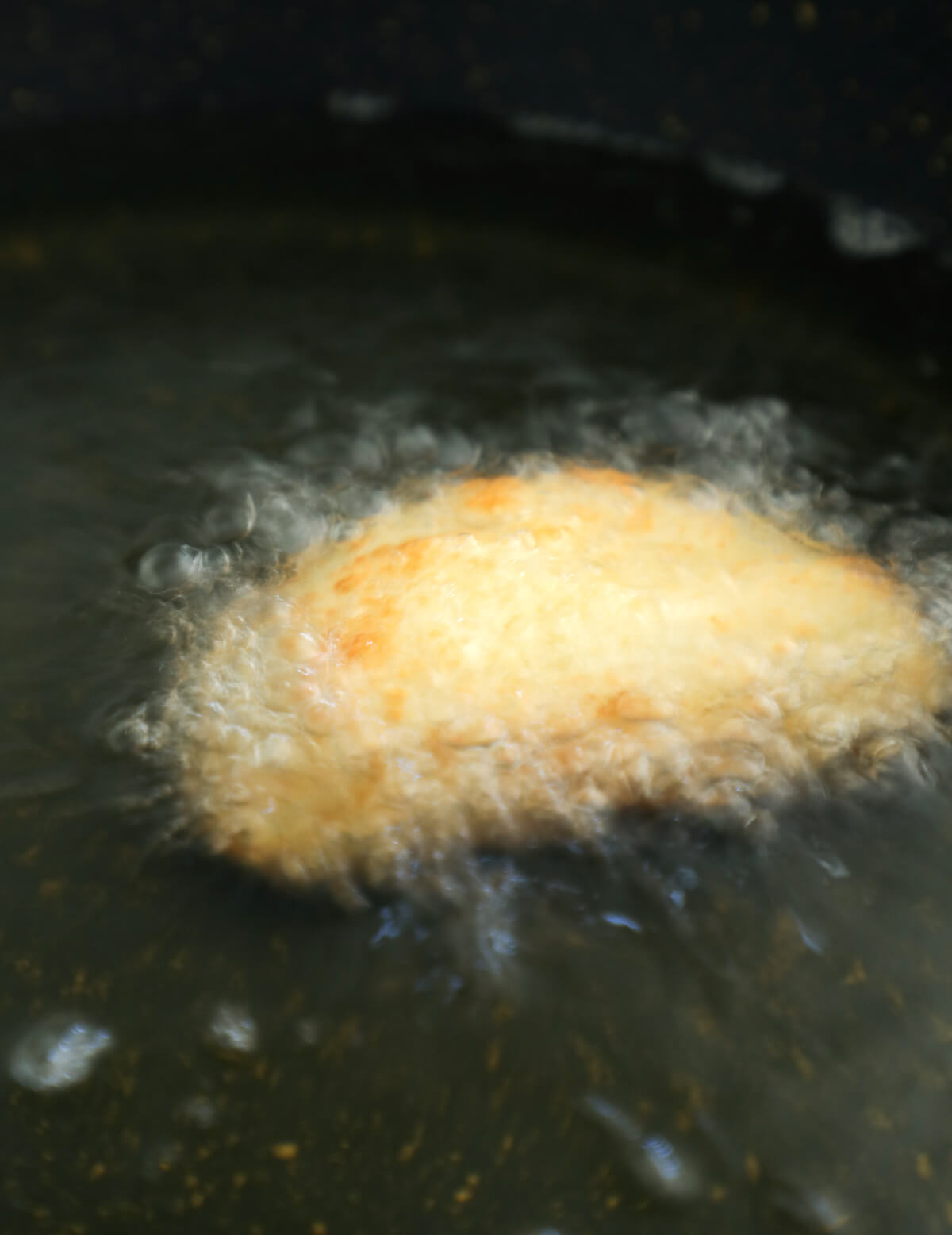 Keto Crab Rangoons in the fryer