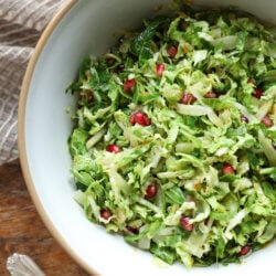 Keto Brussels Sprouts Slaw in a vintage pottery bowl