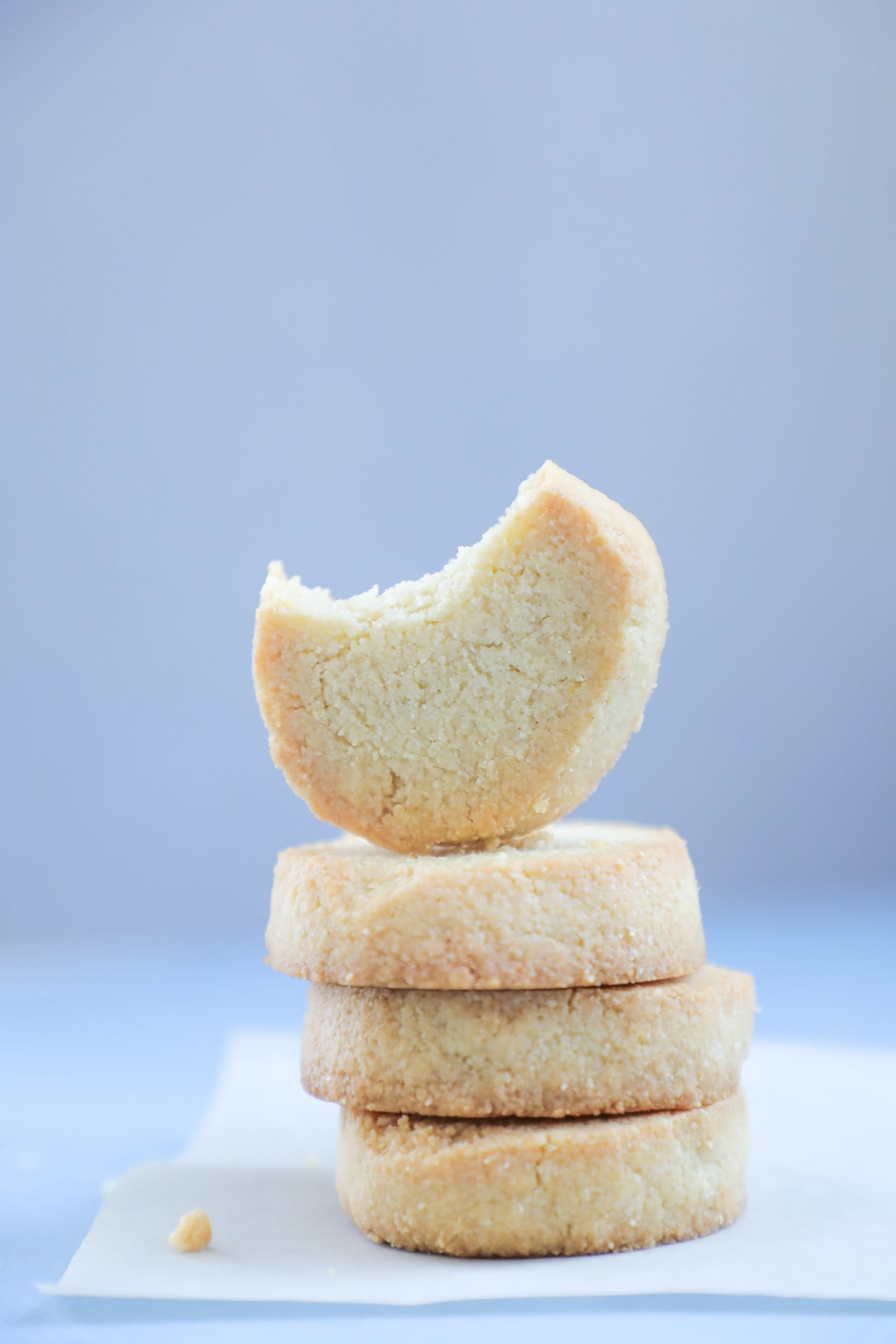 Keto Lemon Shortbread Cookie with a bite taken out of it.