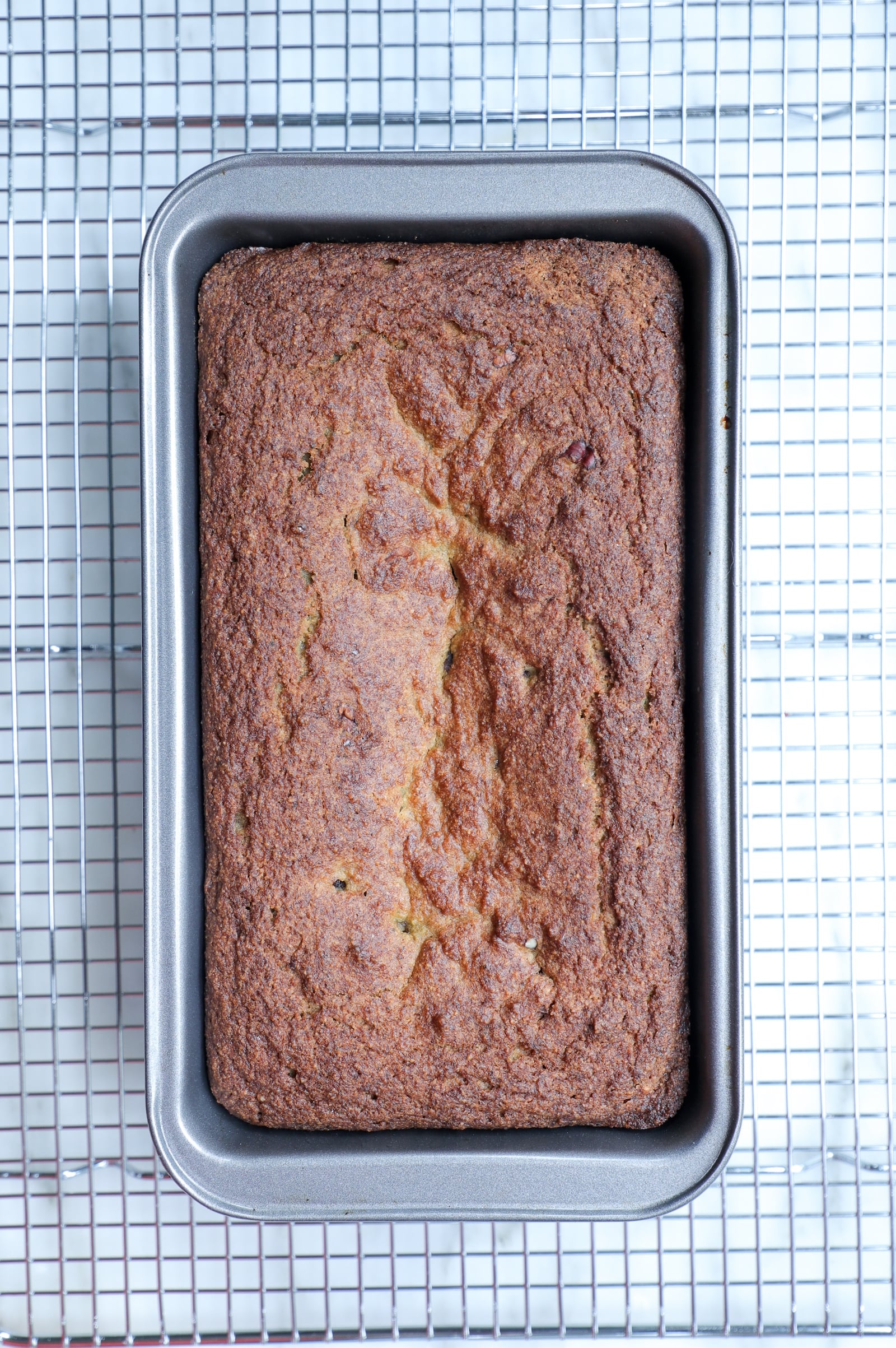 Bread pan with keto zucchini bread after baking