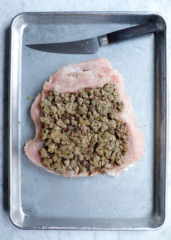 process shot of turkey roulade before rolling