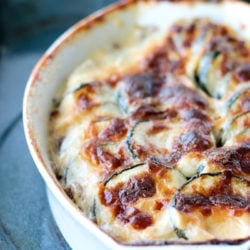 Easy Keto Zucchini Gratin in a white casserole dish after baking