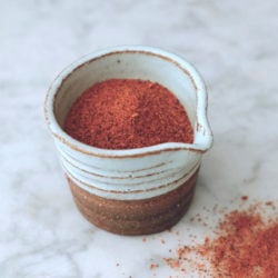 cajun seasoning on white marble board
