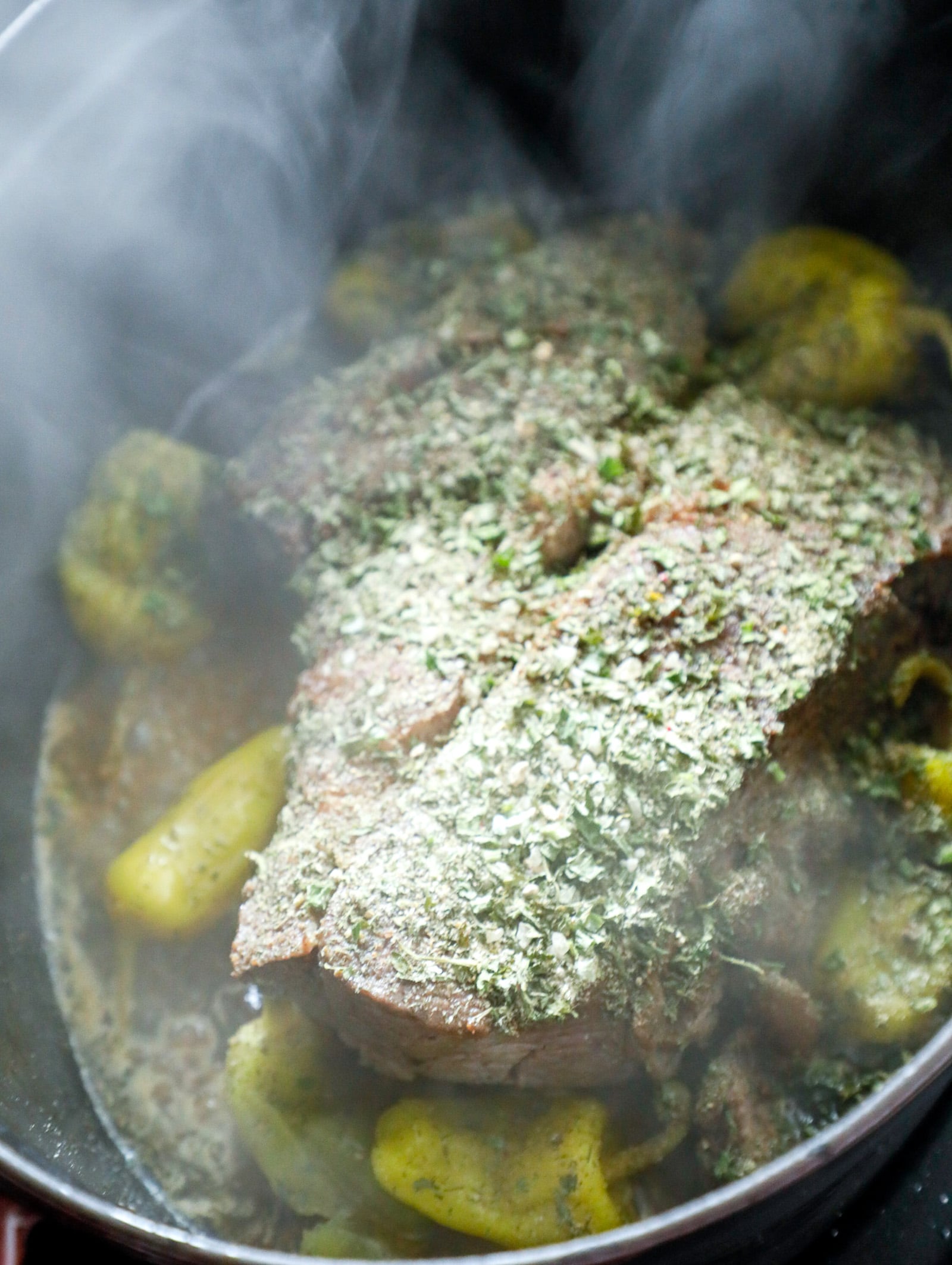 After searing in the Dutch Oven and before braising step.